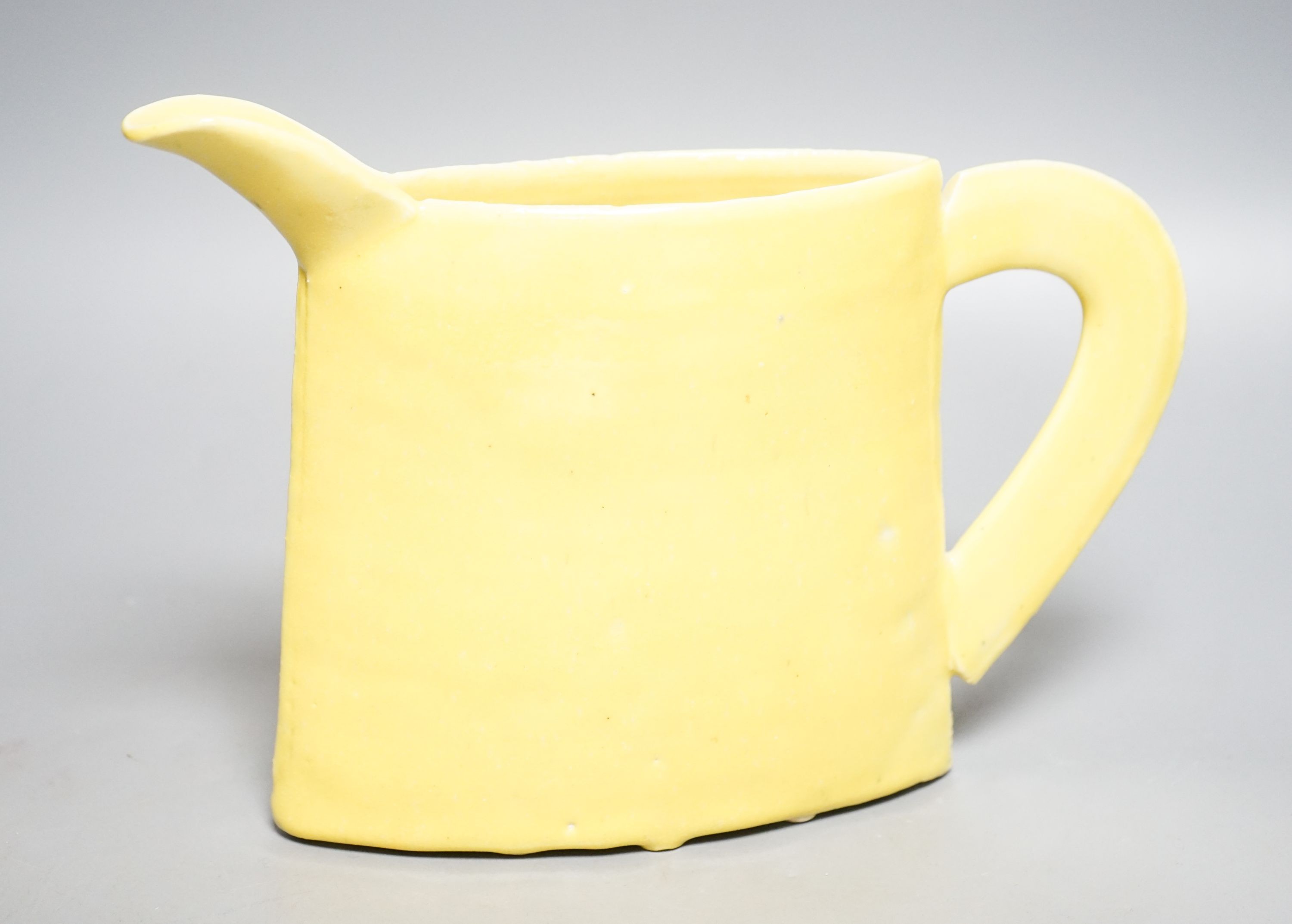 Emmanuel Cooper (1938-2012), a yellow glazed jug 20cm